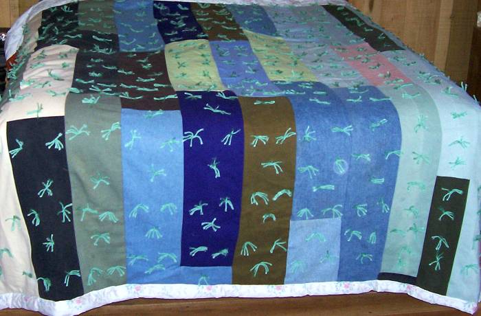 Denim quilt on a bed